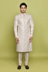 Aryavir Malhotra_Cream Sherwani Brocade Embroidered Floral Thread With Churidar _at_Aza_Fashions