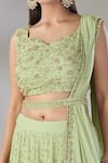 Astha Narang_Green Net Embroidered Floral Jaal Sweetheart Heavy Work Lehenga Set_Online_at_Aza_Fashions