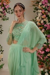 Preeti S Kapoor_Green Georgette Embroidered Cutdana Round Pre-draped Ruffled Saree With Blouse _at_Aza_Fashions