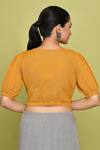 Shop_Nazaakat by Samara Singh_Yellow Cotton Solid V-neck Blouse_at_Aza_Fashions