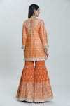 Shop_Samyukta Singhania_Orange Georgette Embroidered Zardozi Round Kurta Sharara Set_at_Aza_Fashions