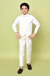 Shop_Petite Pomme_Cream Cotton Satin Sequins Geometric Embroidered Coat Pant Set _Online_at_Aza_Fashions