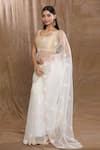 Buy_Samyukta Singhania_Off White Glass Tissue Hand Embroidered Beaded Saree With Running Blouse _Online_at_Aza_Fashions