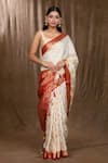 Shop_Samyukta Singhania_White Satin Silk Woven Floral And Zari Pattern Saree With Running Blouse _at_Aza_Fashions