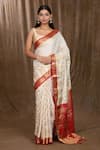 Samyukta Singhania_White Satin Silk Woven Floral And Zari Pattern Saree With Running Blouse _Online_at_Aza_Fashions