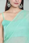 Samyukta Singhania_Green Lurex Shimmery Glistening Glow Saree _at_Aza_Fashions