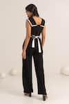 Shop_Kritika Madan Label_Black Crepe Plain Double Collared Jumpsuit With Belt _at_Aza_Fashions