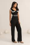 Kritika Madan Label_Black Crepe Plain Double Collared Jumpsuit With Belt _Online_at_Aza_Fashions