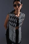 Devina Juneja_Black Scrap Leather Dori Weave Round Neck Monochrome Jacket _Online_at_Aza_Fashions