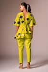 Shop_neetiandmudita_Yellow Cotton Polka Dots Tie-up V Neck Asymmetric Peplum Top And Pant Co-ord Set _at_Aza_Fashions