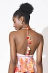 Shop_Rishi and Vibhuti_Orange Crepe Printed Floral And Stripe Halter Neck Sway Symphony Top With Skirt _at_Aza_Fashions