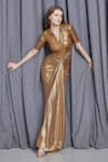 Cham Cham_Gold Knit Lame Embellished Sequin Collar Neck Metallic Draped Gown _at_Aza_Fashions