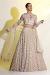 Buy_MeenaGurnam_Beige Net Embroidered Sequins Blouse Round And Beads Lehenga Set _at_Aza_Fashions