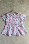 Shop_Khela_Pink Linen Print Floral Peplum Top With Divided Skorts _at_Aza_Fashions