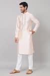 Hilo Design_Peach Semi Raw Silk Embroidery Resham Oxlip Floral Placket Kurta _at_Aza_Fashions