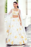 Khushboo Chugh_Ivory Net Embellished Beads Scoop Floral Lehenga Set _Online_at_Aza_Fashions