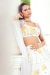 Shop_Khushboo Chugh_Ivory Net Embellished Beads Scoop Floral Lehenga Set _Online_at_Aza_Fashions