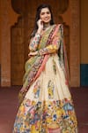 aindhri by mahitha_Cream Chennur Silk Hand Painted Kalamkari Fauna Sweetheart Lehenga Set _at_Aza_Fashions