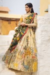 aindhri by mahitha_Cream Chennur Silk Hand Painted Kalamkari Giraffes Botanical Lehenga Set _Online_at_Aza_Fashions