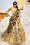 Buy_aindhri by mahitha_Cream Chennur Silk Hand Painted Kalamkari Giraffes Botanical Lehenga Set _at_Aza_Fashions