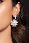 Buy_Tsara_Silver Plated Crystal Floral Carved Cutwork Earrings_at_Aza_Fashions