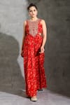 Shop_Shreya J Label_Red Crepe Print Sequin Round Neck Floral Cut-out Jumpsuit_at_Aza_Fashions