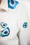 Buy Richaa Goenka White Cotton Hand Embroidery Abstract Evil Eye Collared Shirt Online at Aza Fashions Buy_Richaa Goenka_White Cotton Hand Embroidery Abstract Evil Eye Collared Shirt _Online_at_Aza_Fashions