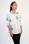 Buy Richaa Goenka White Cotton Hand Embroidery Abstract Evil Eye Collared Shirt Buy_Richaa Goenka_White Cotton Hand Embroidery Abstract Evil Eye Collared Shirt