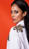 Buy Richaa Goenka White Cotton Sequins, Embroidery Collared Asymmetric Kurta With Pant Online at Aza Fashions Buy_Richaa Goenka_White Cotton Sequins, Embroidery Collared Asymmetric Kurta With Pant _Online_at_Aza_Fashions