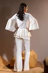 TYOHAR_Ivory Crepe Embroidery Sequin V Neck Mahra Pearl Peplum Top With Bootcut Pant _Online_at_Aza_Fashions