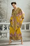 Rajdeep Ranawat_Yellow Silk Printed Floral V Neck Dalilah Draped Kaftan Tunic_at_Aza_Fashions