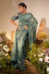 Buy_Midushi Bajoria_Green Shimmer Tissue Embroidery Bloom Swarovski Embellished Saree With Blouse _at_Aza_Fashions