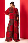 Shop_LABEL SHRISTI CHETANI_Red Crepe Printed Closed Round Neck Box Fit Jumpsuit_at_Aza_Fashions