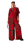 LABEL SHRISTI CHETANI_Red Crepe Printed Closed Round Neck Box Fit Jumpsuit_Online_at_Aza_Fashions