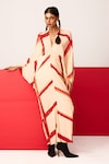 Buy_LABEL SHRISTI CHETANI_Beige Crepe Printed Linear V-neck Kimono Shift Dress _at_Aza_Fashions