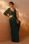 Shop_Nitika Gujral_Green Satin, Net Beads, Smocking Tassel Embellished Pre-draped Saree With Blouse _at_Aza_Fashions