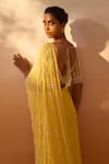 Buy_Nitika Gujral_Yellow Georgette, Net Pearls, Beads Ray Embellished Pre-draped Saree With Blouse 