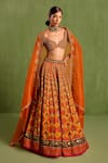 Buy_Neha Khullar_Orange Viscose Raw Silk Embellished Floral Geometric Mughal Printed Lehenga Set_at_Aza_Fashions