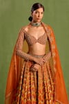 Neha Khullar_Orange Viscose Raw Silk Embellished Floral Geometric Mughal Printed Lehenga Set _at_Aza_Fashions