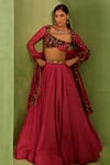 Buy_Neha Khullar_Pink Viscose Raw Silk Print Motif Asymmetric Cutwork Neck Lehenga And Blouse Set_at_Aza_Fashions