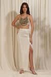 Buy_RIRASA_Ivory Lurex Georgette Embellished Textured Shimmer Slit Skirt With Ghunghroo_at_Aza_Fashions