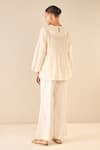 Shop_Shivani Bhargava_Ivory Cotton Embroidered Thread Whispering Roses Tunic Top With Flared Pant _at_Aza_Fashions