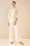 Shivani Bhargava_Ivory Cotton Embroidered Thread Mandarin Rose Melody Top With Flared Pant _Online_at_Aza_Fashions