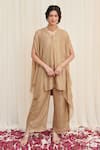 Buy_RIRASA_Beige Synthetic Embellished Sequin Tripataka Asymmetric Textured Kurta With Pant _at_Aza_Fashions