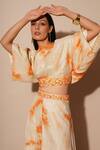 Chaashni by Maansi and Ketan_Orange Foil Printed Georgette Embellished Abstract Top With Flared Pant_Online_at_Aza_Fashions