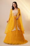 Buy_Chaashni by Maansi and Ketan_Yellow Georgette Embellished Sequin Cape Open Solid Pleated Lehenga Set_at_Aza_Fashions