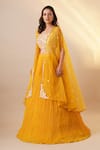 Shop_Chaashni by Maansi and Ketan_Yellow Georgette Embellished Sequin Cape Open Solid Pleated Lehenga Set_at_Aza_Fashions