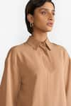 PERONA_Brown Cotton Solid Collared Blaire Asymmetric Shirt _at_Aza_Fashions