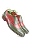 Shop_FELLMONGER_Green Glossed Textured Leather Perforated Oxford Shoes _at_Aza_Fashions