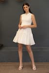 Buy_Ozel_White Viscose Crepe Solid High Neck Parker Pleat Detailed Short Dress_at_Aza_Fashions
